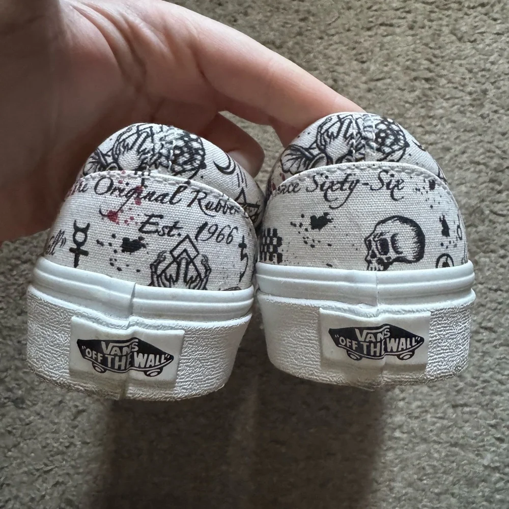 Vans White Slip-On Sneakers with Black Tattoo Graphics and Red Splatter - Picture 2 of 4